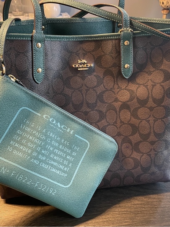 Coach Handbags - Coach Classic Brown Signature Canvas ReversibleTote with Teal Wristlet.